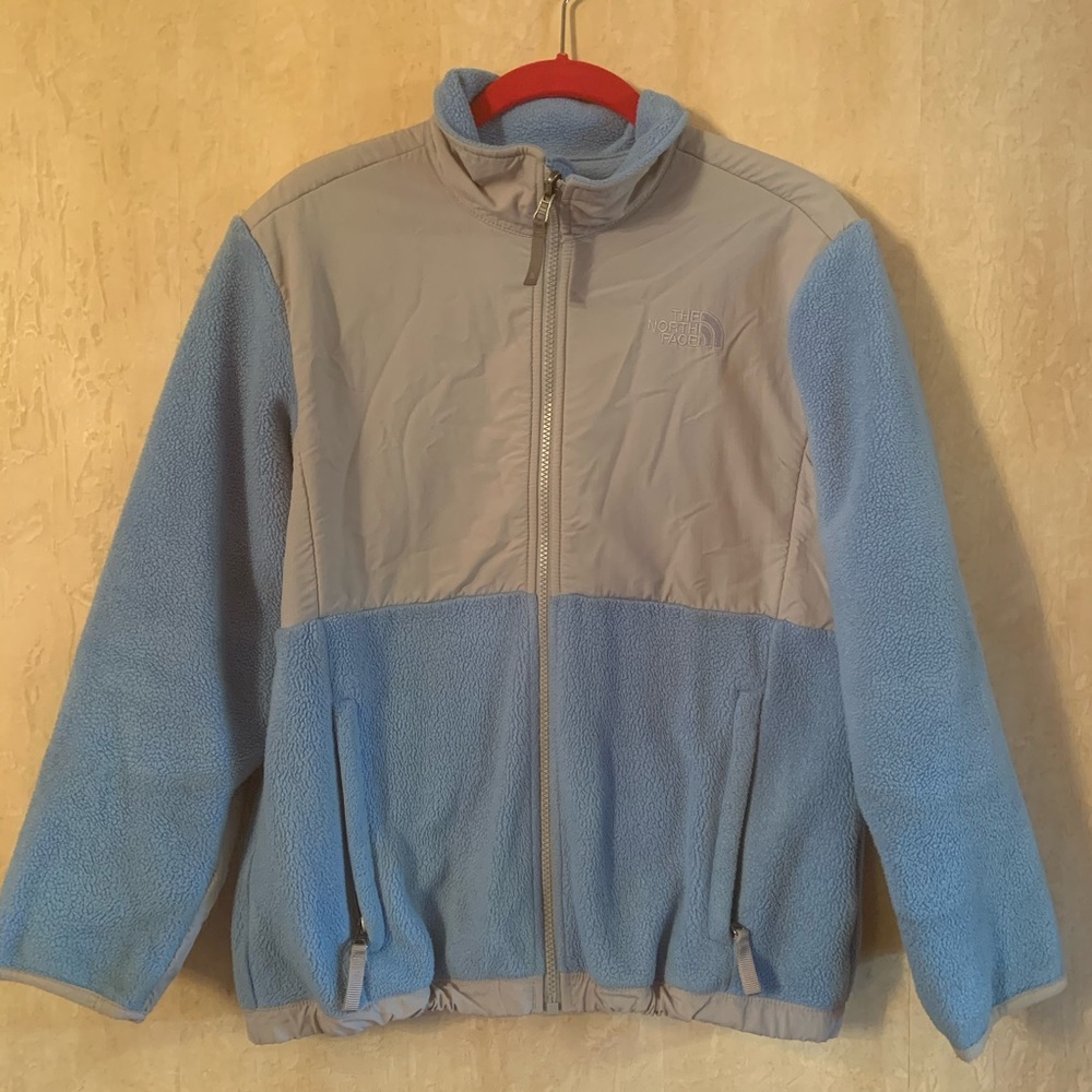 Girl’s light blue Northface fleece jacket